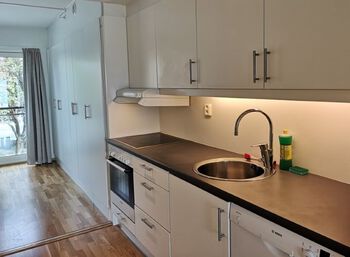 Cabinetry ,Kitchen sink ,Countertop ,Sink ,Building.