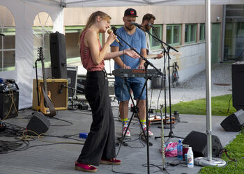 Musical instrument ,Microphone ,Public address system ,Shorts ,Musician.