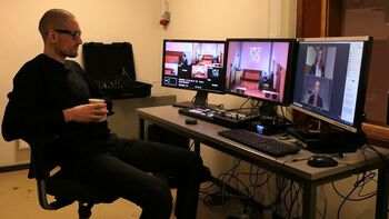 Research assistant Aleksander Tidemann in control of the live stream during the PhD defence of Agata Zelechowska.
