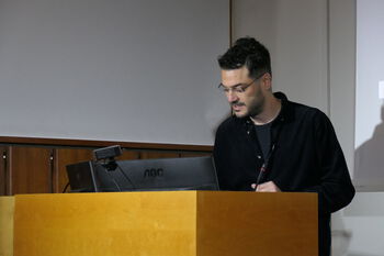 Glasses ,Microphone ,Podium ,Lectern ,Public address system.