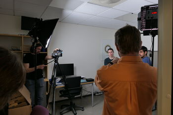 Shoulder ,Videographer ,Tripod ,Television crew ,Film crew.